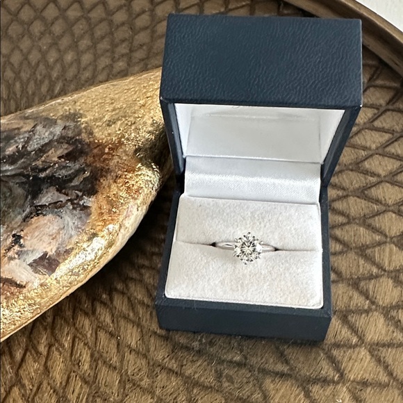 Charles and Colvard Forever Brilliant 1.9 carat solitaire engagement ring.